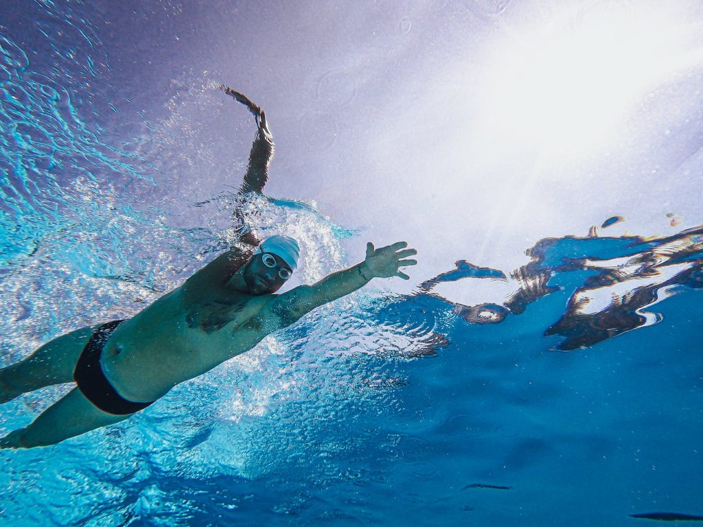 swimmer swimming underwater